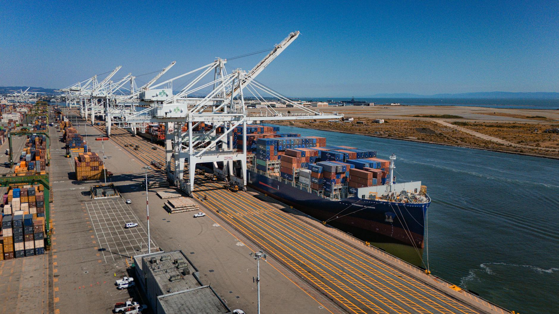 cargo ship docked at port of oakland